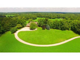 TRACTS 1 & 2 - REAL ESTATE AUCTION - 2 PRESTIGUOUS HOMES - 66+/- ACRES IN 5 TRACTS IN NOBLE COUNTY, INDIANA